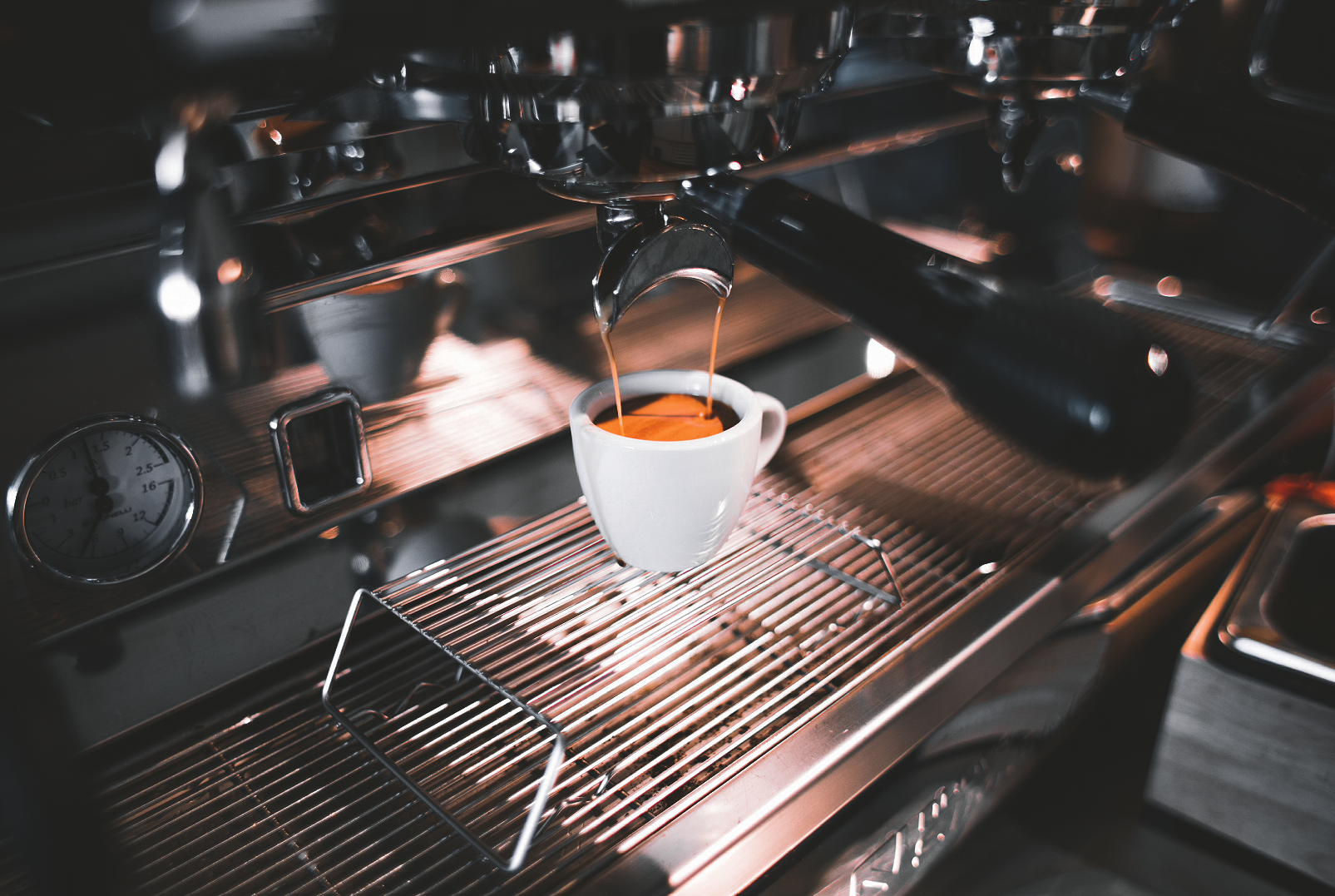 Espresso coffee machine making coffee