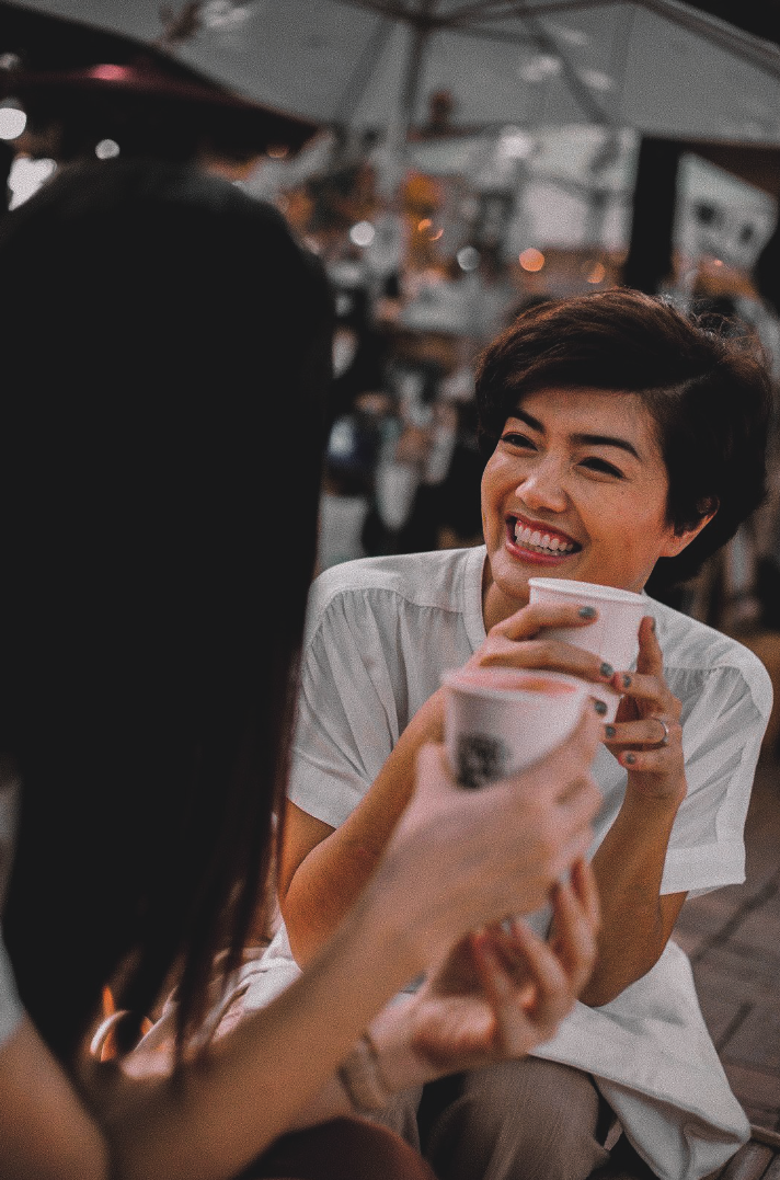 Happy customer with a cup